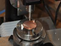 Centering the rotation table to drill the hole in the dial